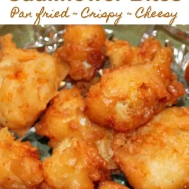 Crispy cheddar fried cauliflower bites on a serving plate