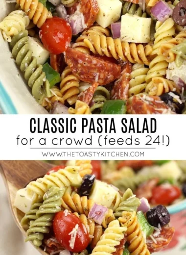 Bowl of classic pasta salad with fresh vegetables and dressing