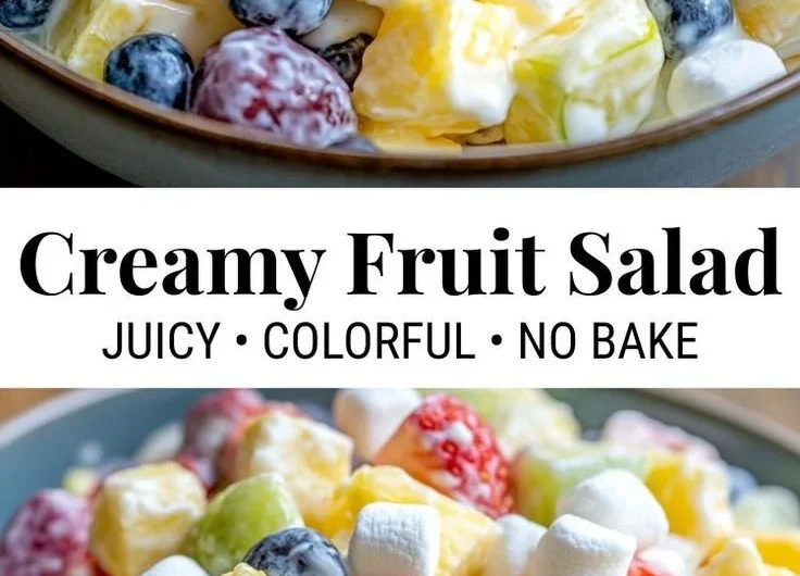 Bowl of creamy fruit salad with mixed fruits and a light dressing