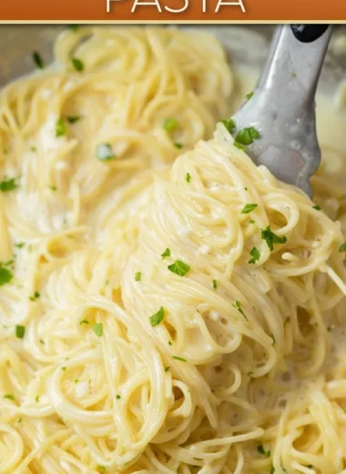 Creamy Garlic Parmesan Pasta garnished with parsley in a bowl