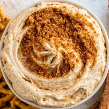 Delicious churro dip served in a bowl with churros for dipping