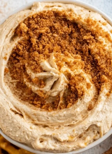 Delicious churro dip served in a bowl with churros for dipping