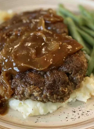 Delicious easy Salisbury steak served with rich gravy on a plate