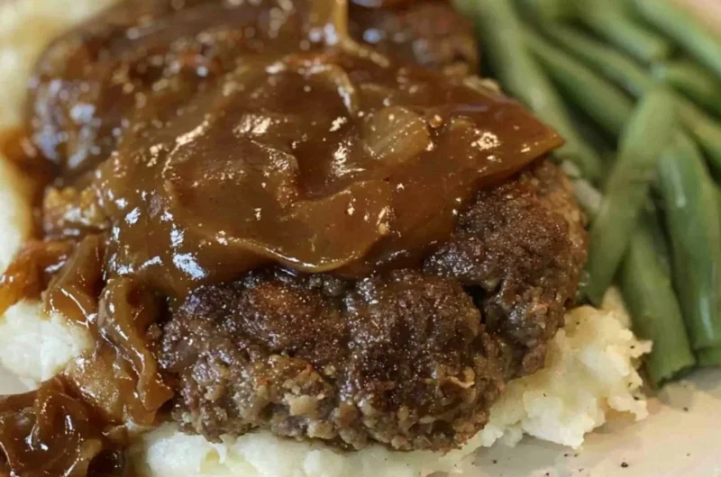 Delicious easy Salisbury steak served with rich gravy on a plate
