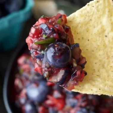 Fresh fruit blueberry salsa blended with vibrant berries and spices
