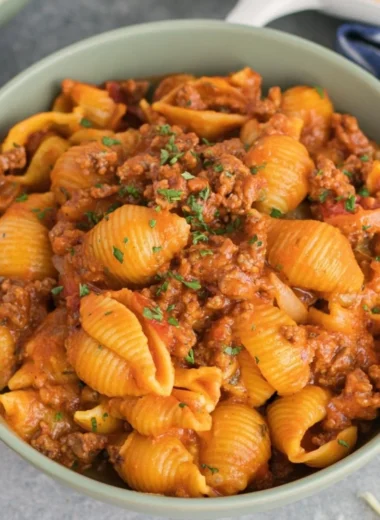 High protein taco pasta served in a bowl with fresh toppings