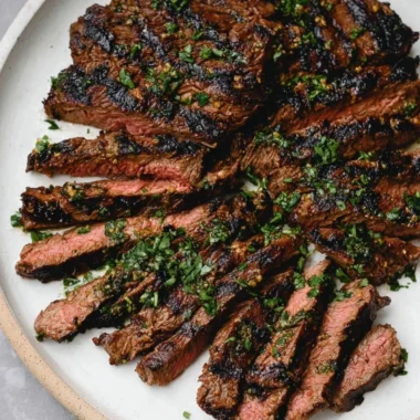 Italian skirt steak sliced with citrus marinade on a plate