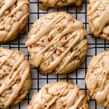 Freshly baked maple brown sugar cookies on a cooling rack.