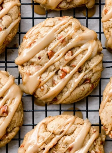 Freshly baked maple brown sugar cookies on a cooling rack.