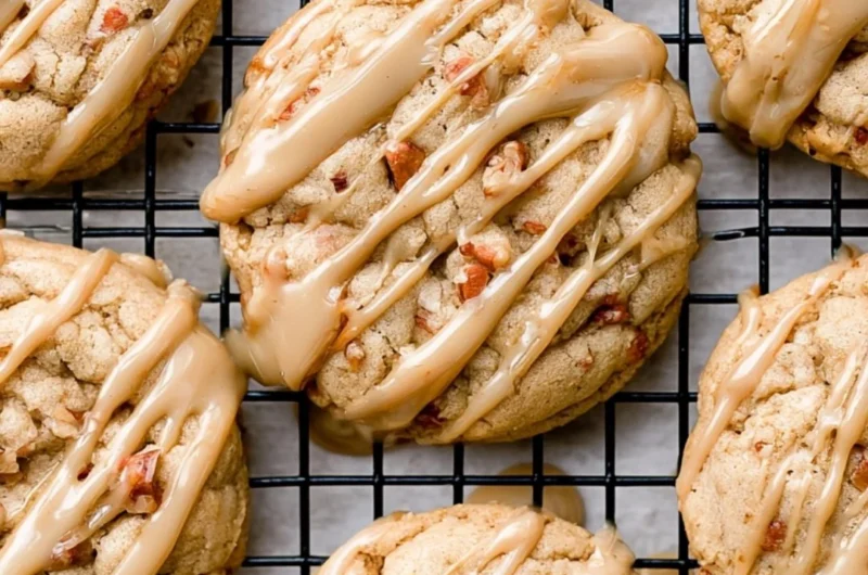 Freshly baked maple brown sugar cookies on a cooling rack.