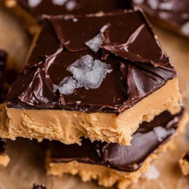 Peanut butter chocolate Greek yogurt bark with nuts and chocolate drizzle