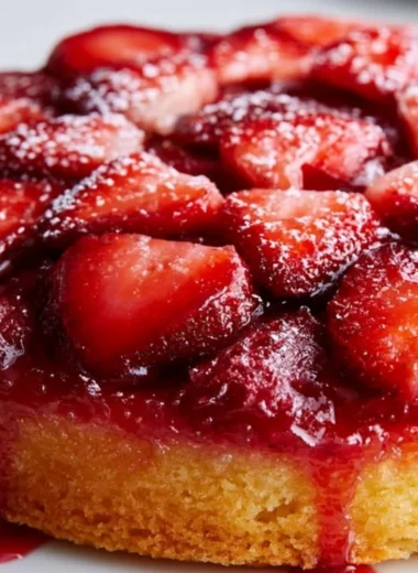 Delicious Strawberry Upside Down Cake with fresh strawberries and caramel glaze