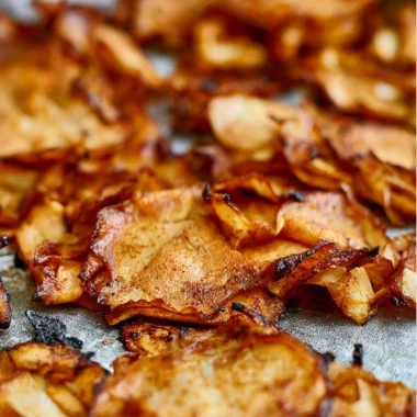 A variety of vegan tofu deli meat slices on a wooden board, ideal for sandwiches.