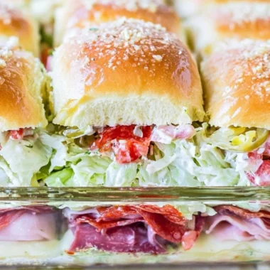 Delicious Italian Grinder Sliders served on a platter at a cozy gathering