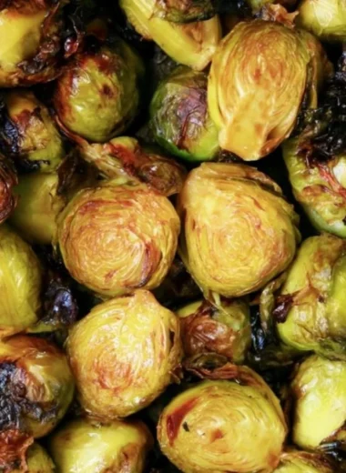 Cozy Brussels sprouts drizzled with balsamic glaze on a plate