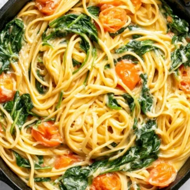 Delicious cozy garlic butter pasta topped with fresh herbs in a bowl