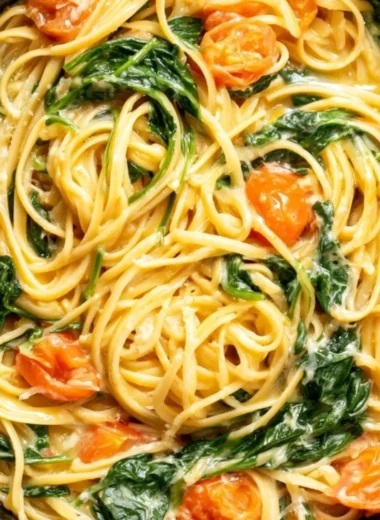 Delicious cozy garlic butter pasta topped with fresh herbs in a bowl