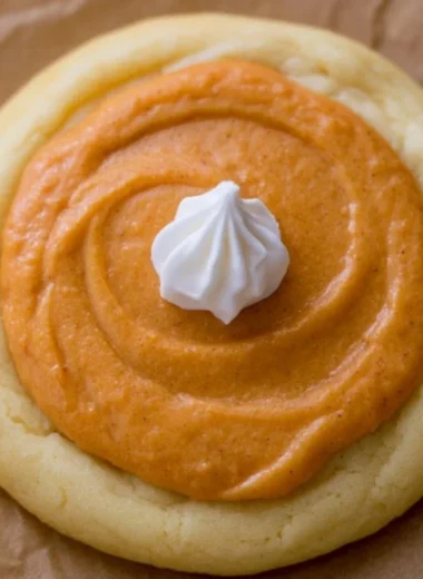 Delicious Crumbl pumpkin pie cookies with fall spices and creamy frosting