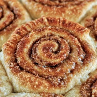 Delicious easy one hour cinnamon rolls baked fresh and ready to serve.
