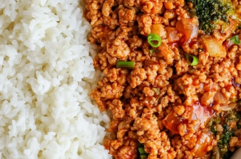 Firecracker ground chicken dish garnished with fresh herbs