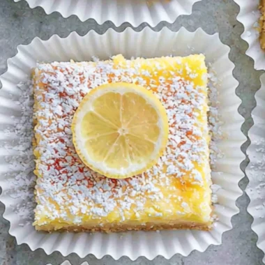 Delicious lemon cream cheese bars with a creamy lemon topping and a buttery crust