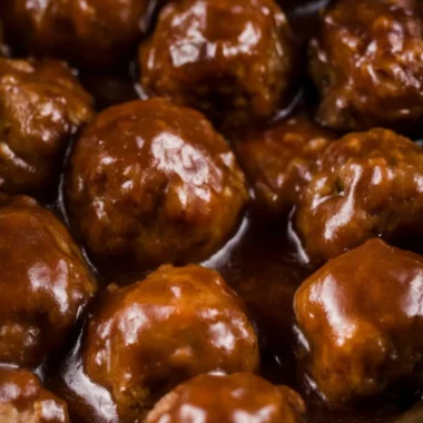 Slow cooker Salisbury steak meatballs served with gravy and mashed potatoes