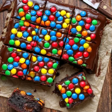 Delicious Sourdough Cosmic Brownies with chocolate glaze and colorful sprinkles