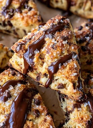 Freshly baked sourdough discard scones on a wooden table