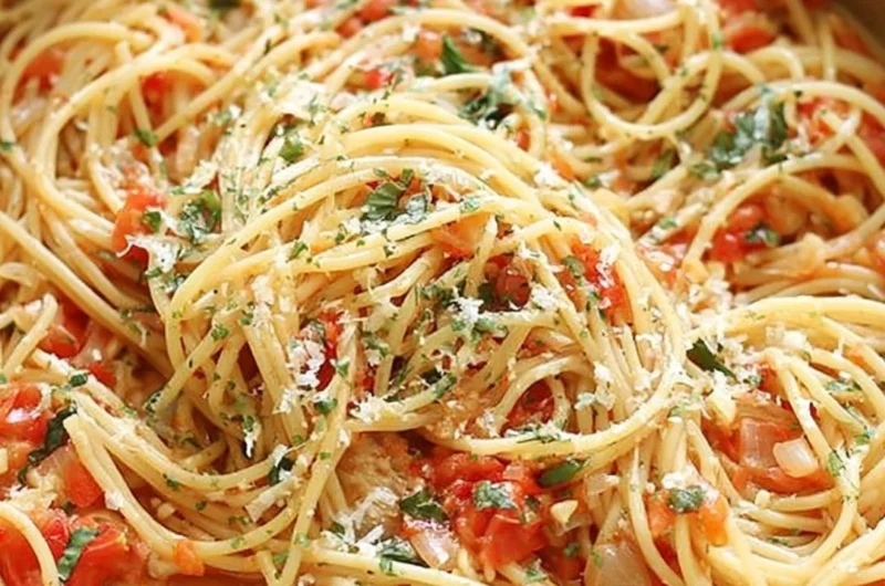 Delicious cozy one pot pasta dish garnished with herbs and served in a bowl