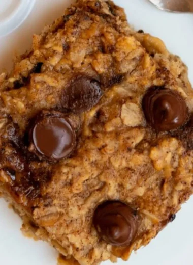 Delicious banana oatmeal bars stacked on a wooden table