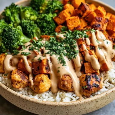 Healthy chicken sweet potato bowl with vegetables and spices