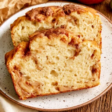 Moist and tender cinnamon apple bread with fresh apple slices and a cinnamon swirl