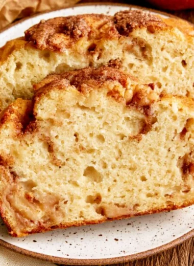 Moist and tender cinnamon apple bread with fresh apple slices and a cinnamon swirl