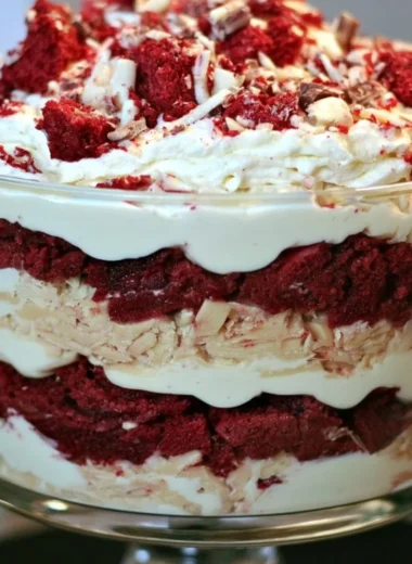 Delicious Red Velvet Trifle layered with cake and cream